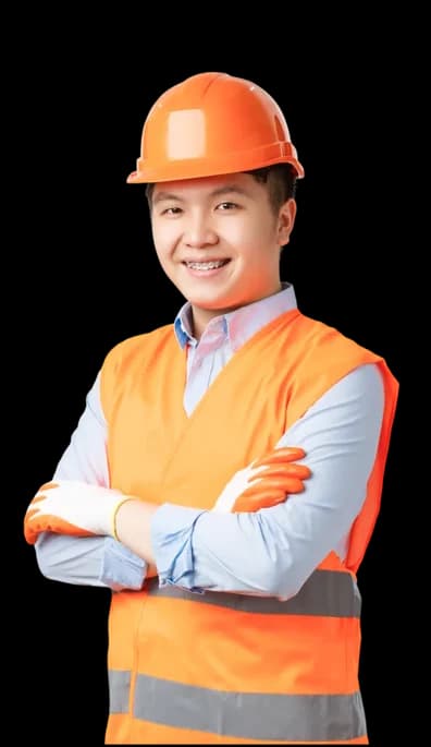 Construction manager in a safety helmet with arms crossed